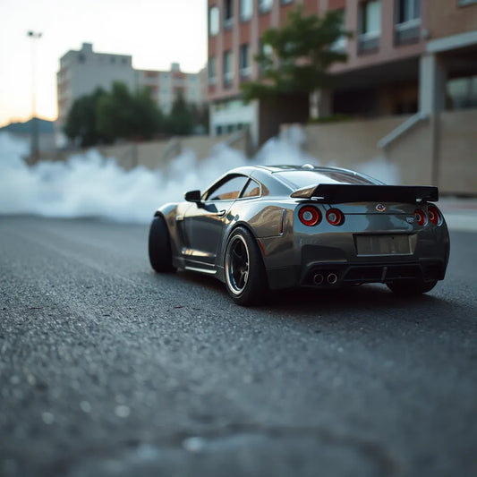 RC drift car mid-slide on asphalt with turned wheels and visible tire smoke
