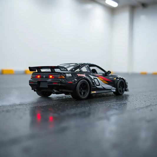 Small RC drift car sliding on wet track with visible tire traction and motion blur
